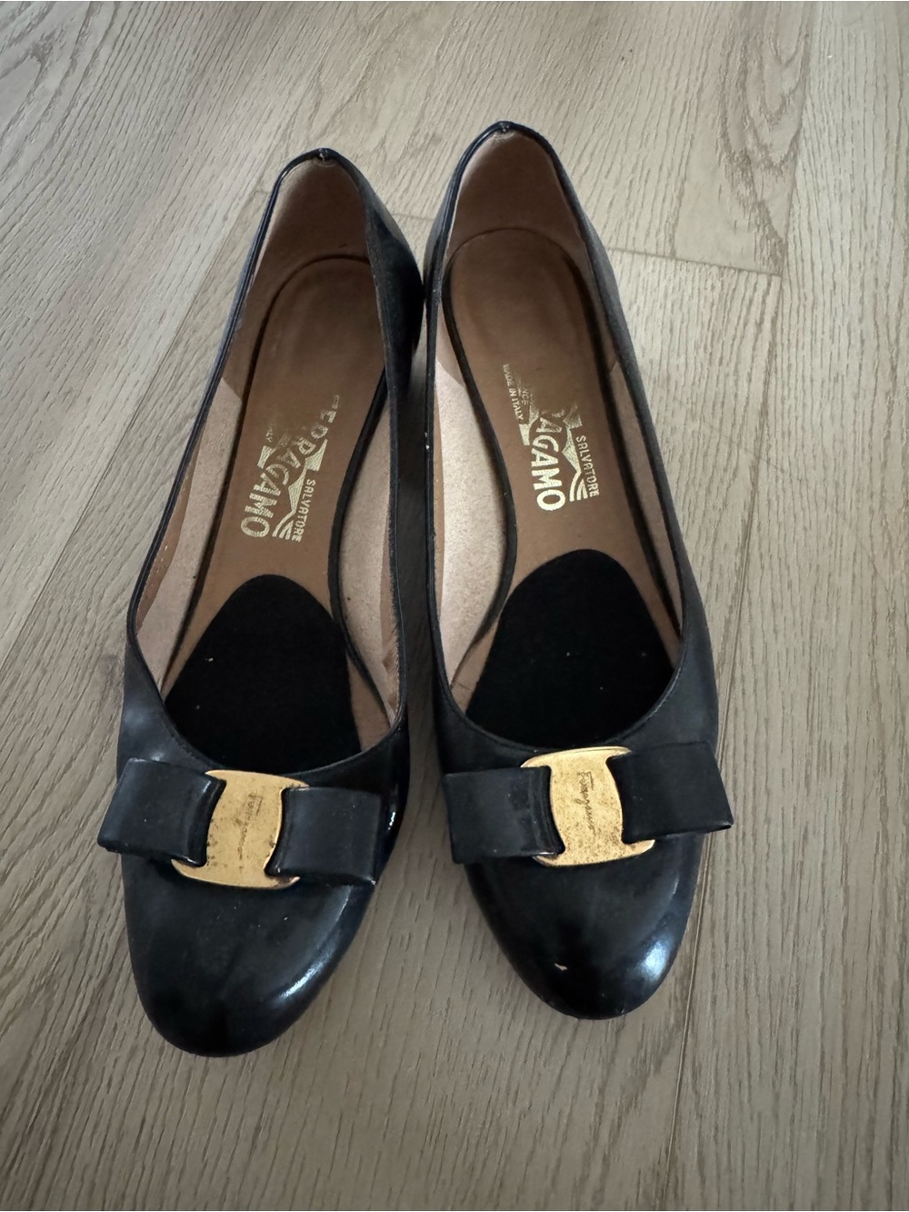 Salvatore Ferragamo Black Leather Bow Flats with Gold Hardware